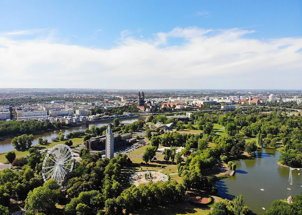 Aerial view of Magdeburg, capital of Saxony-Anhalt, seen from above Stadtpark, 30 July 2020.