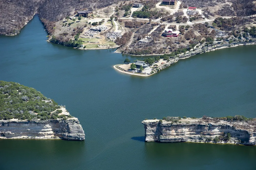 Aerial view of Possum Kingdom Lake, Texas, in the Hell's Gate area after wildfires.