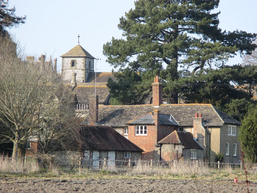 St Mary's Church and buildings of Wiston House near Steyning, West Sussex, 17 March 2016, seen from the south.