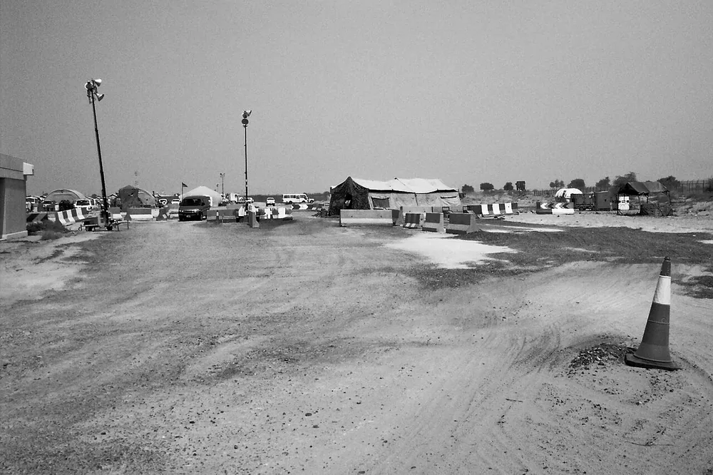 The U.S. Air Force main gate at Al Minhad Air Base, United Arab Emirates, 5 August 2003.