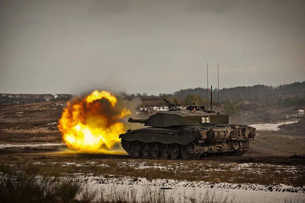A Challenger 2 main battle tank of The Queen's Royal Hussars during a live-firing exercise at Hohne ranges, Germany, 20 February 2013.