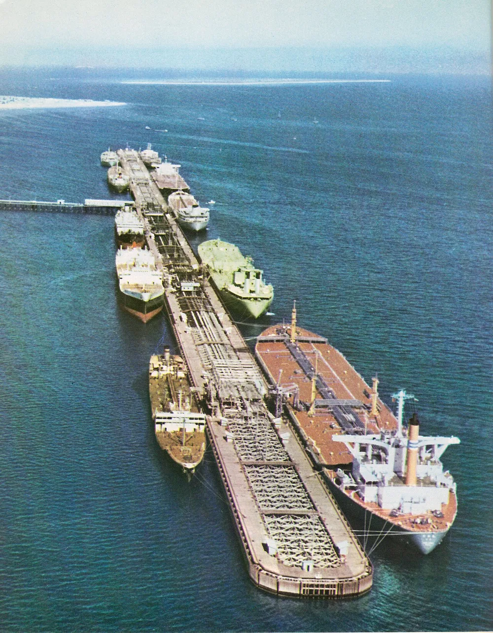 Large oil tankers loading at the Kharg Island oil terminal in the Persian Gulf, photographed in 1967.