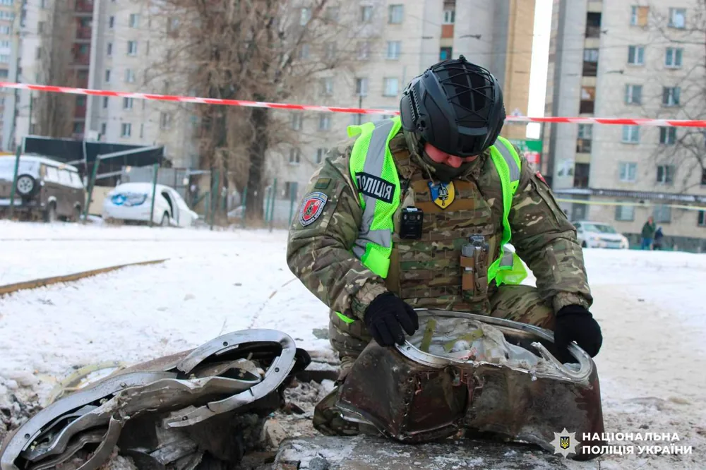 A Kyiv police sapper beside remnants of an unexploded Russian Iskander-M warhead in Dniprovskyi District, Kyiv, on 24 January 2026.