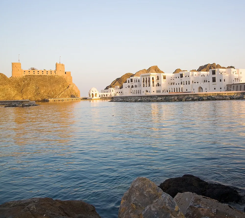 Old Muscat harbour walls on the Gulf of Oman coast of Oman, March 2008.
