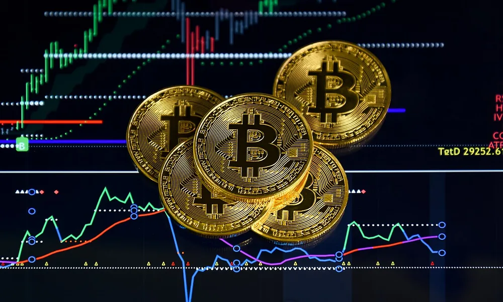 Physical bitcoin tokens arranged on a surface, photographed January 2021.