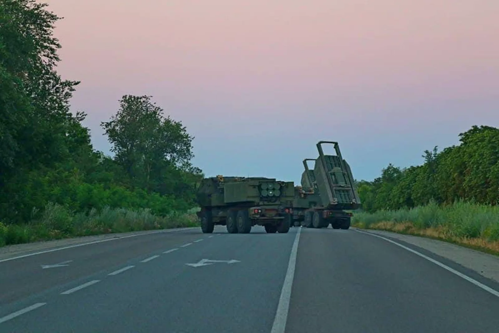 M142 HIMARS rocket launchers on a road, the kind of Western-supplied system used in Ukraine's war