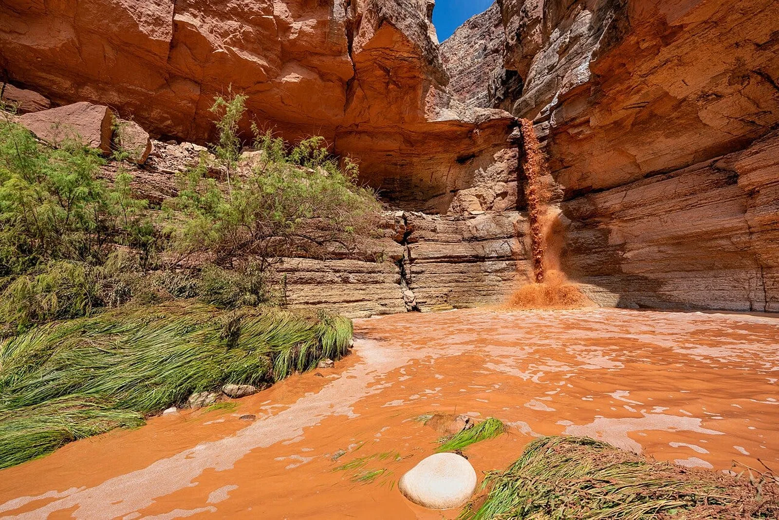 Desert canyon flash flood after monsoon rain. Hurricane Polo's remnants combined with monsoon moisture to trigger flash-